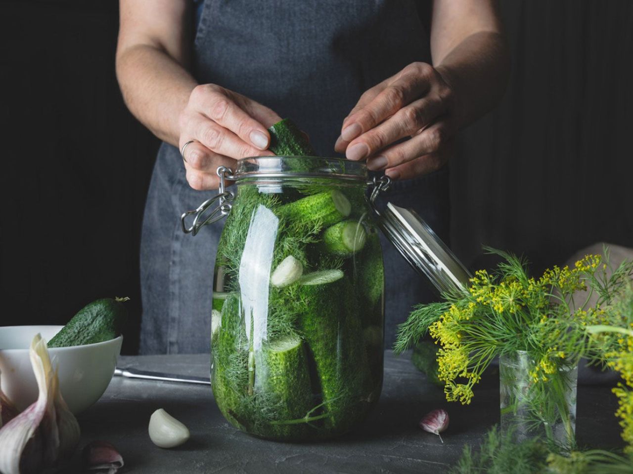 Person Canning Pickles