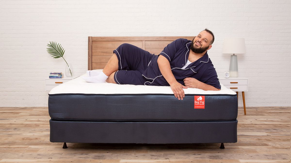 A person with a heavy build lies on a Big Fig Mattress