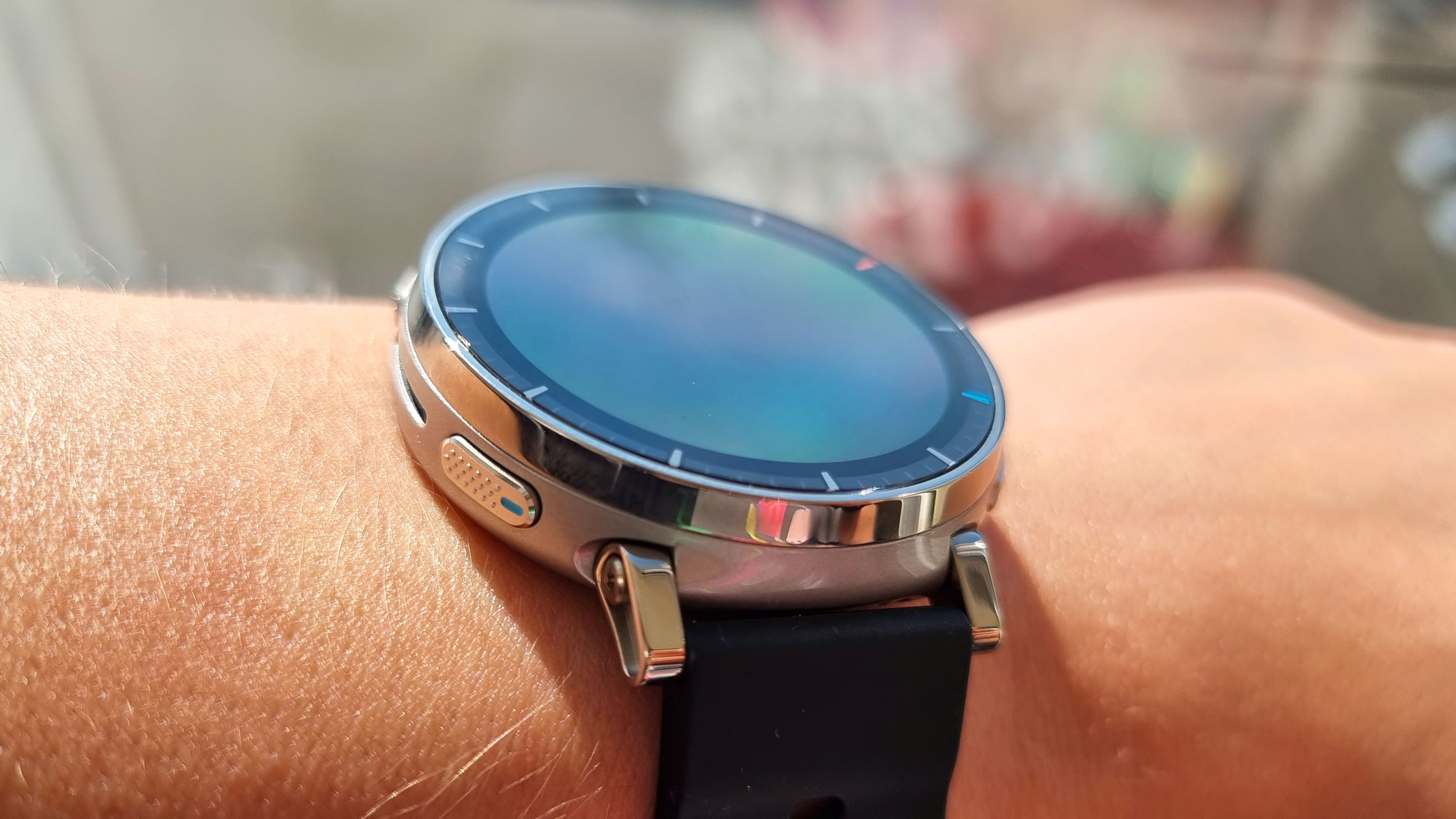 a close-up picture of our reviewer wearing the Amazfit Active 3 Premium smartwatch
