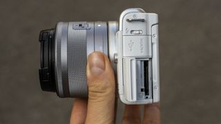 Image shows a side view of the Canon EOS M200 camera