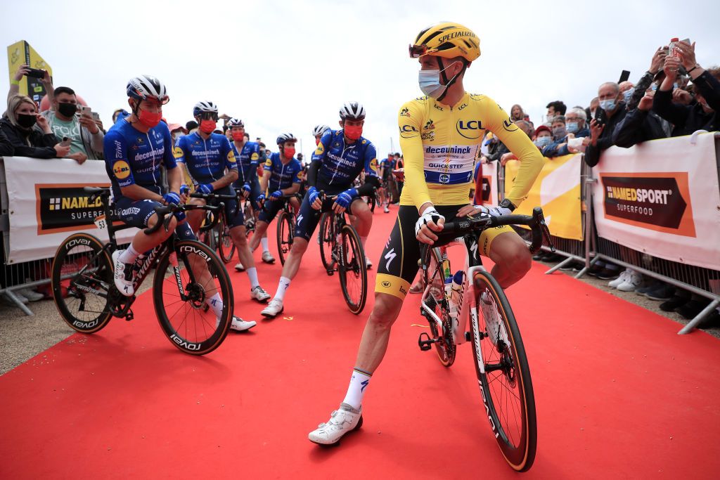MRDEBRETAGNE GUERLDAN FRANCE JUNE 27 Julian Alaphilippe of France and Team Deceuninck QuickStep Yellow Leader Jersey at start and Teammates during the 108th Tour de France 2021 Stage 2 a 1835km stage from PerrosGuirec to MrdeBretagne Guerldan 293m LeTour TDF2021 on June 27 2021 in MrdeBretagne Guerldan France Photo by Christophe PetitTesson PoolGetty Images