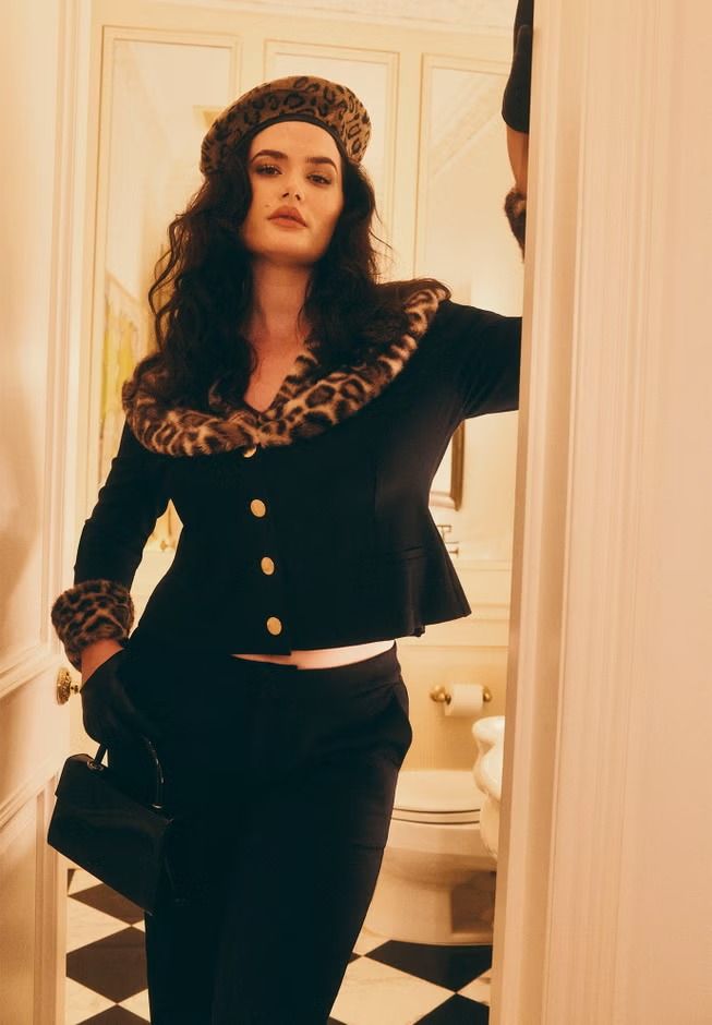 Eloquii model wears pieces from the fall/winter 2026 collection.