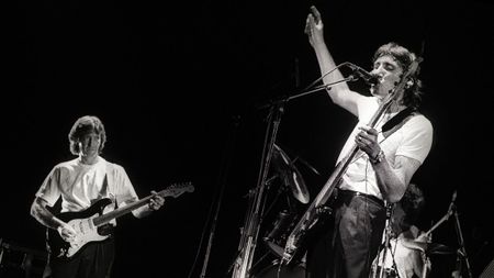 Roger Waters and Eric Clapton playing live in 1984