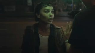 Zoe Kravitz looking up in a dark place in Caught Stealing.