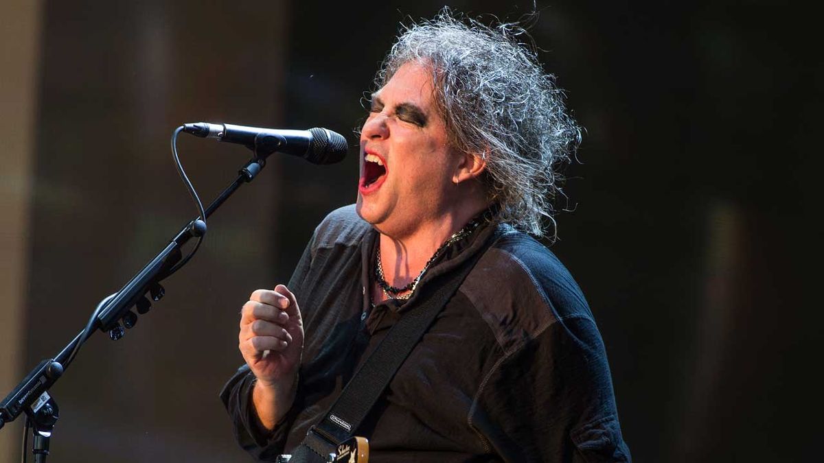 Watch goth legends The Cure play brooding Lullaby from new live movie