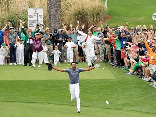 Tony Finau celebrating a hole-in-one at the 2018 Masters par-3 contest moments before dislocating his ankle