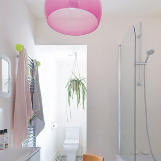 bathroom, diamond geo floor tiles, bath shower screen pink glass lamp shade