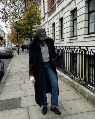 Georgia wearing long coat