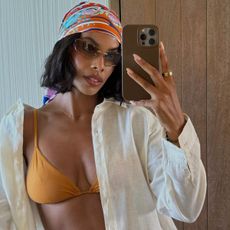 Rochelle Humes taking a mirror selfie on holiday in a bikini top with a beachy bob hairstyle