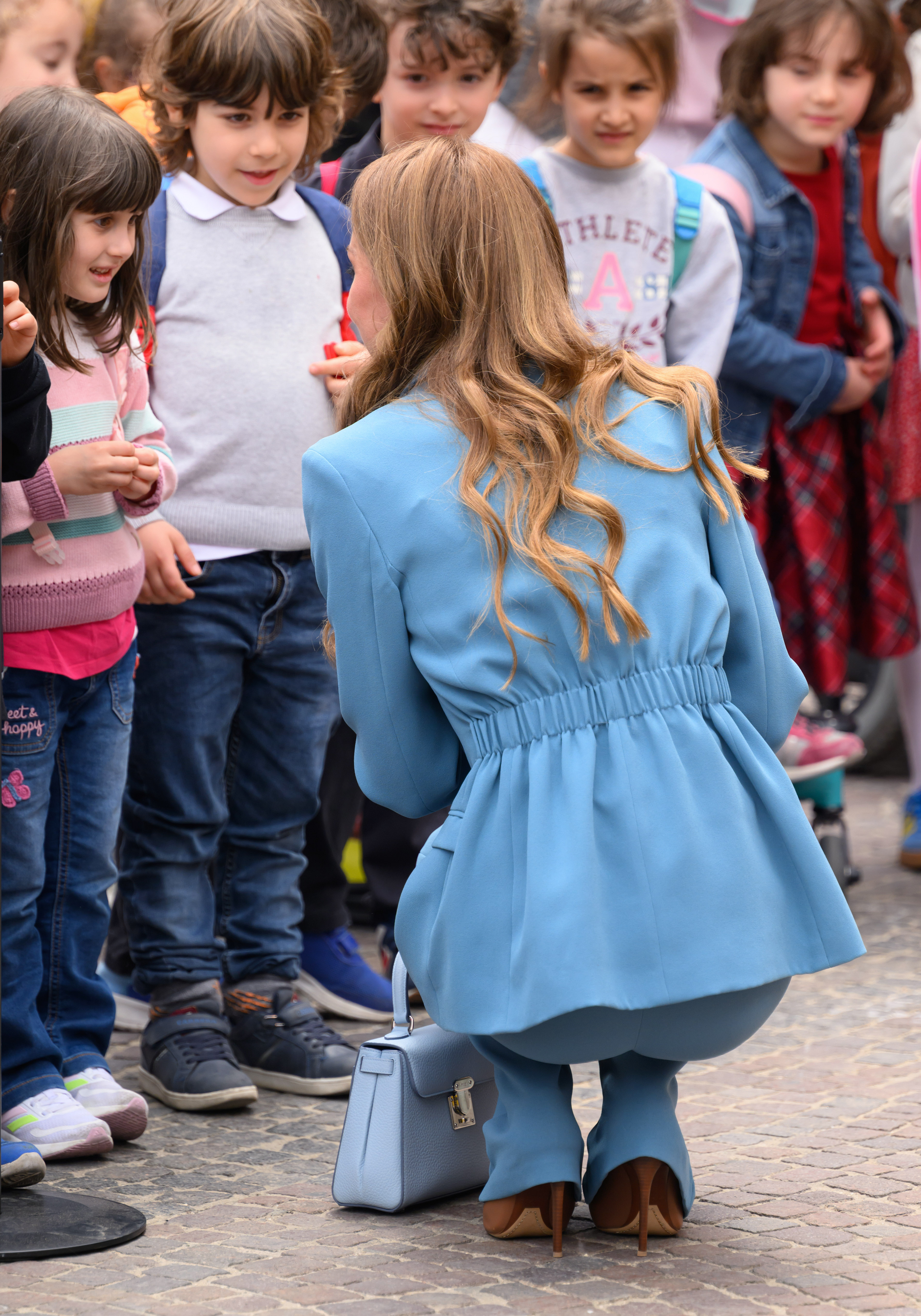 Kate Middleton carries a new powder blue Asprey bag during her visit to Italy