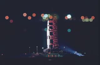 Artistic lighting creates a striking picture of the Apollo 11 Saturn V on the evening of May 20.