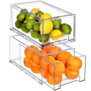 Clear Pull Out Organizer Bins. One is filled with oranges and the other is stacked on top with lemons and limes