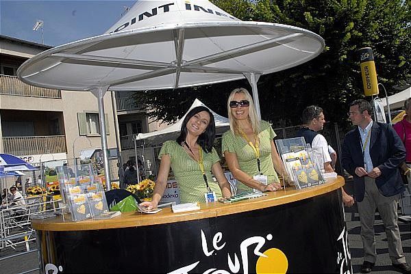 The promotional girls were smiling as always.