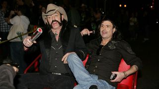 Lemmy Kilmister and Phil Campbell of Motorhead leave in a pedicab after a screening of "Lemmy" at the Paramount Theater during the South By Southwest Film Festival on March 15, 2010 in Austin, Texas. 