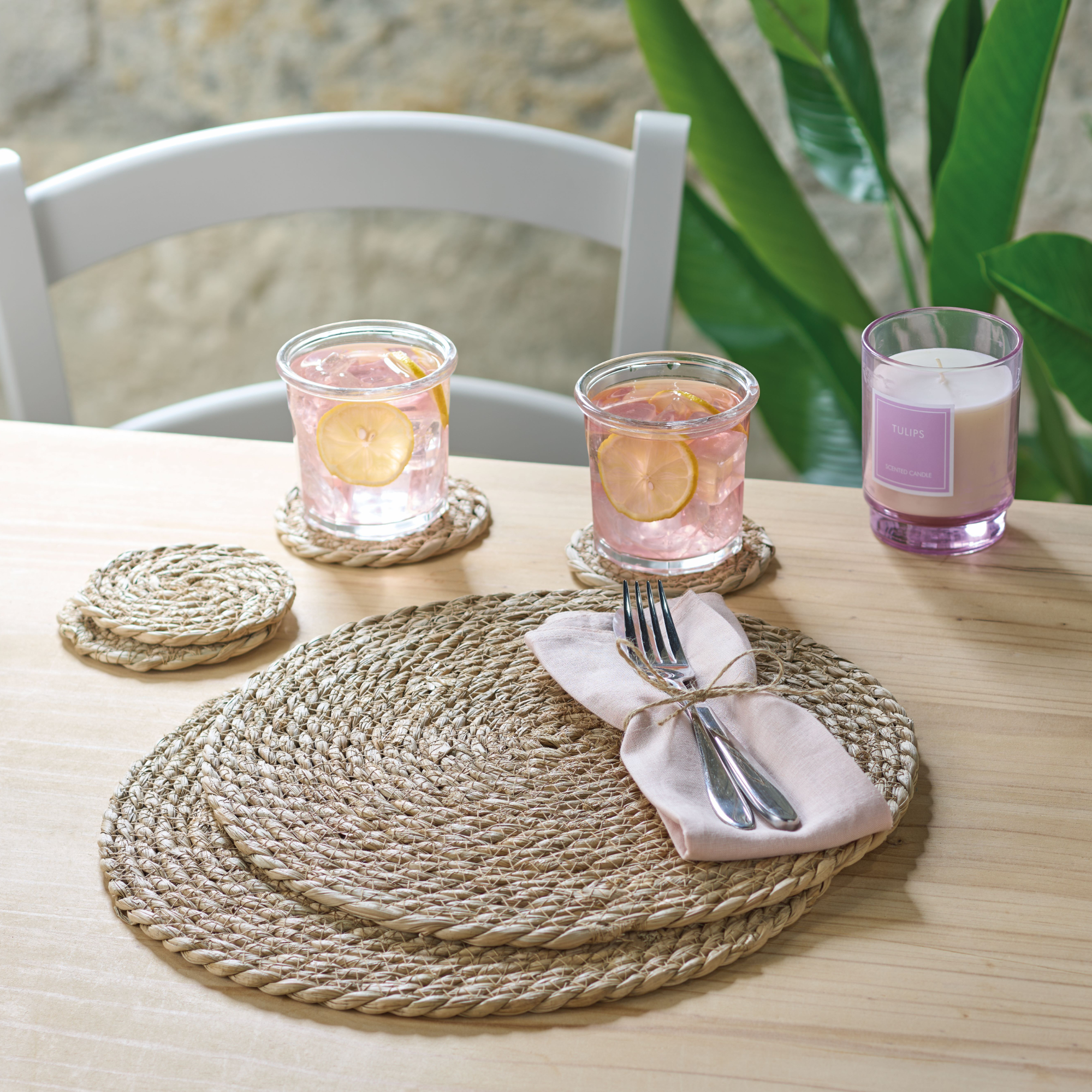 Seagrass placemats and coasters on table