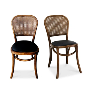 Rattan and leather dining chairs.