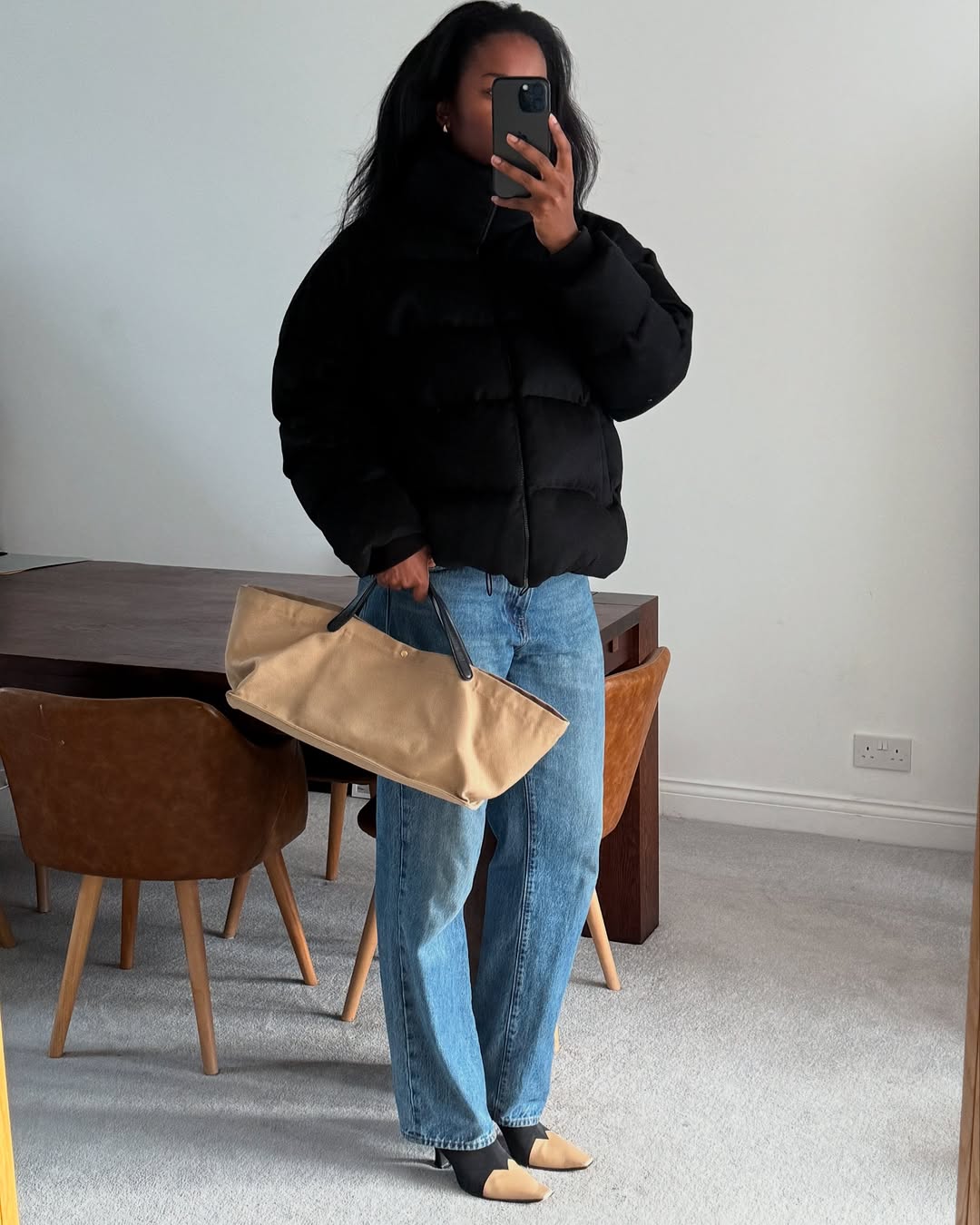 Marilyn NK wearing a puffer coat