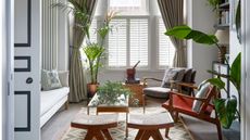mid-century living room with window shutters