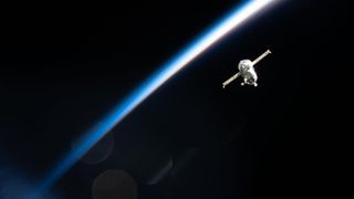 The Roscosmos Progress 92 cargo spacecraft is photographed in March 2026 from the International Space Station as it flies into an orbital sunset 267 miles above Earth&rsquo;s surface.