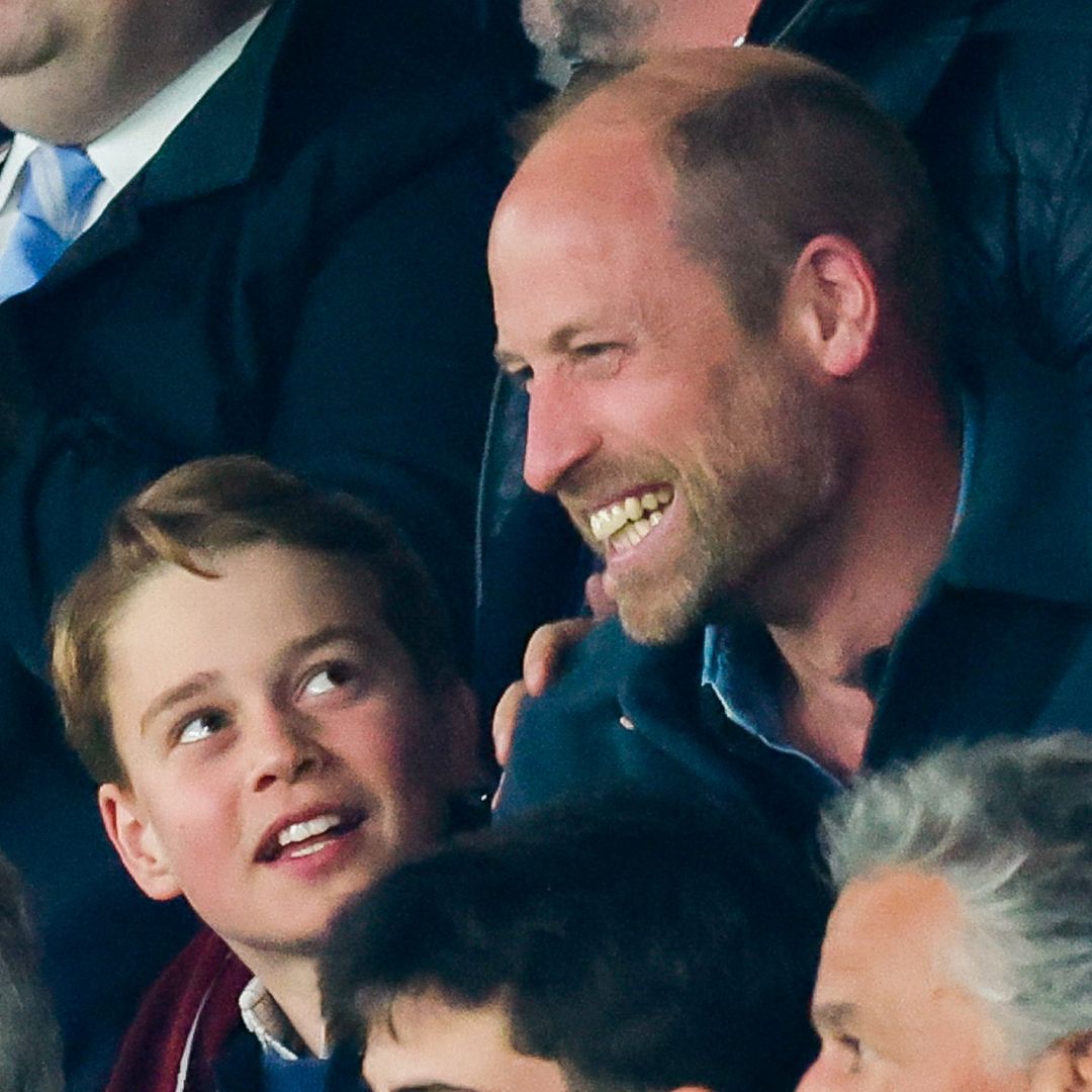 Prince George and Prince William cheer at the UEFA Champions League match between Paris Saint-Germain and Aston Villa FC at Parc des Princes on April 09, 2025