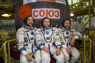 Richard Garriott, Yury Lonchakov and Michael Fincke of Expedition 18