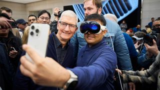 Apple CEO Tim Cook posing for a selfie