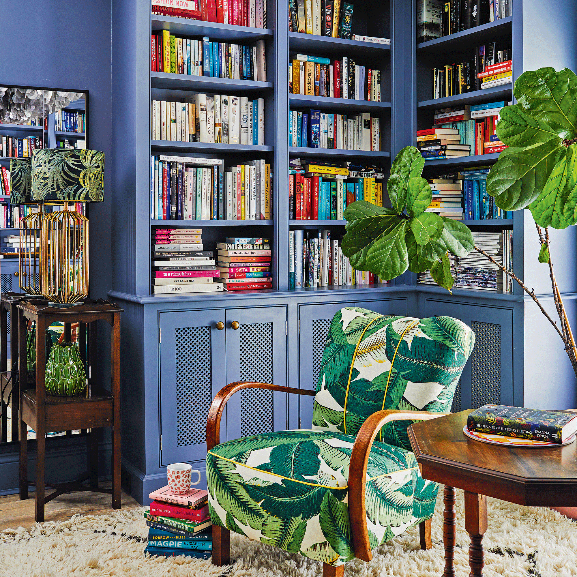 Blue library with palm tree chair