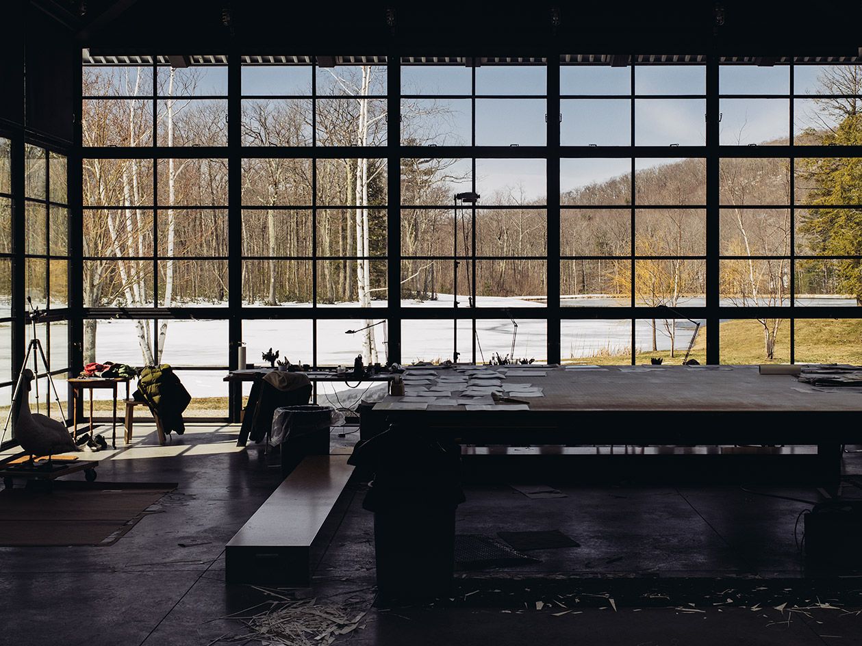 Roni Horn’s studio, with a custom-made 150 sq ft steel table on which she makes her pigment drawings. A step wraps around the table to help her reach to all ends as she makes the works