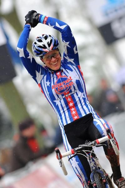 Katie Compton (Planet Bike) celebrates her solo victory in the Kalmthout, Belgium World Cup.