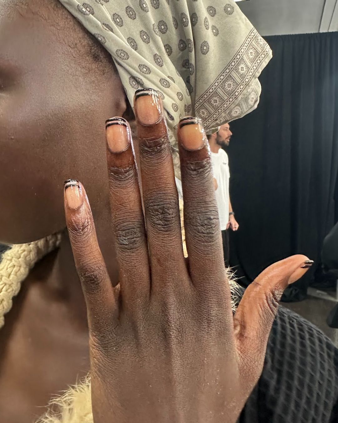An image of the negative space nails backstage at Off White spring/summer 2026.