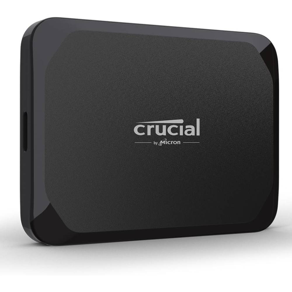 Black Crucial X9 portable SSD against a white background.