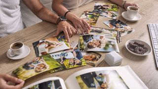 A couple looking over photo albums together