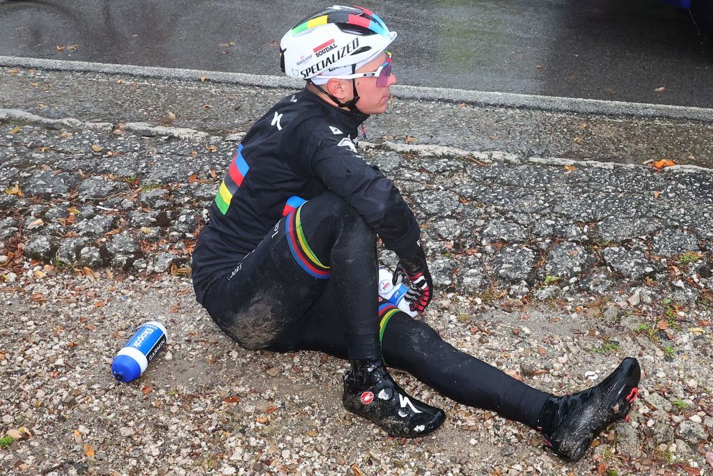 Soudal Quick Steps Belgian rider Remco Evenepoel reacts after crashing during the fifth stage of the Giro dItalia 2023 cycling race 171 km between Atripalda and Salerno on May 10 2023 Photo by Luca Bettini AFP Photo by LUCA BETTINIAFP via Getty Images