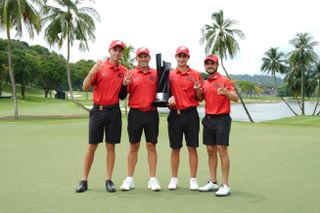 Fireballs GC LIV Golf team pose with the Singapore trophy