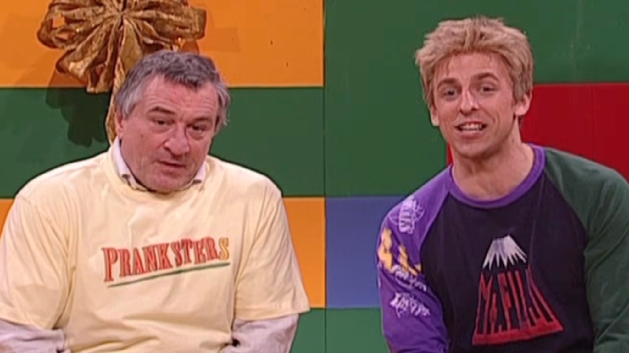 Robert De Niro and Seth Meyers talk during a chat show on SNL.