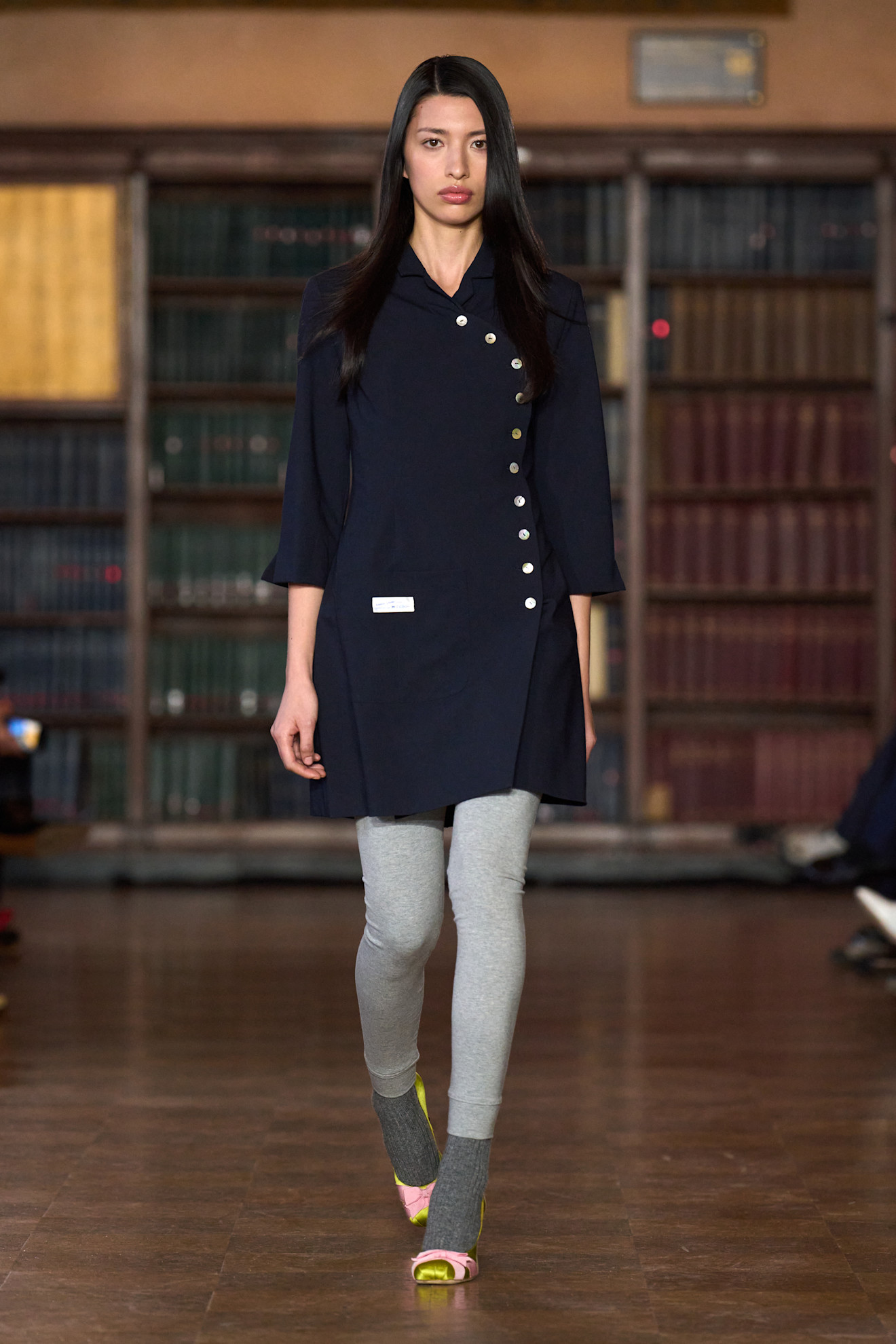 models walk the Sandy Liang Fall 2026 fashion show runway wearing slipper shoes 