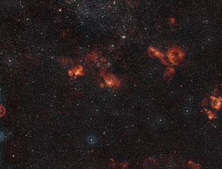A wide-field view of many star-forming regions in the constellation of Dorado, the Swordfish. Image released Nov. 27, 2013.