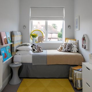 childrens bedroom with soft toys and books