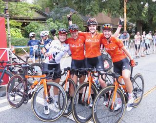 New Zealand criterium champion Olivia Ray (left) celebrates win at 2021 Grant Park Criterium with her Rally Cycling teammates 