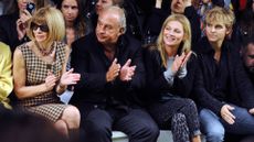 Anna Wintour, Sir Phillip Green, Kate Moss and Brandon Green attend the Unique show during London Fashion Week SS14 at TopShop 