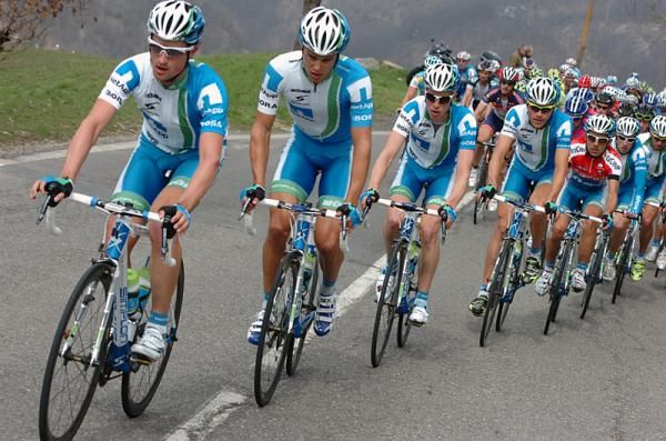 Race leader Cesare Benedetti's Team NetApp squad sets tempo in the peloton.