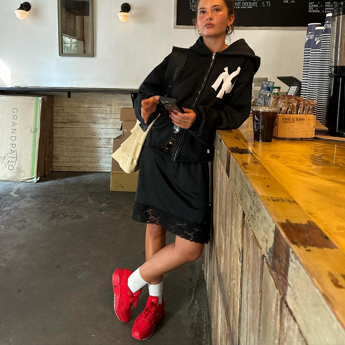 ruby wearing red sneakers