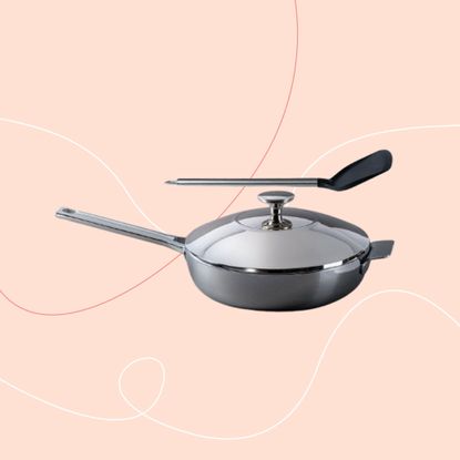 Lakeland stainless steel pan on pink background
