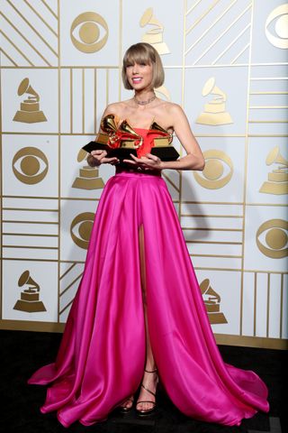 Taylor Swift holds three grammy awards for the album 1989 at the 2016 Grammy awards