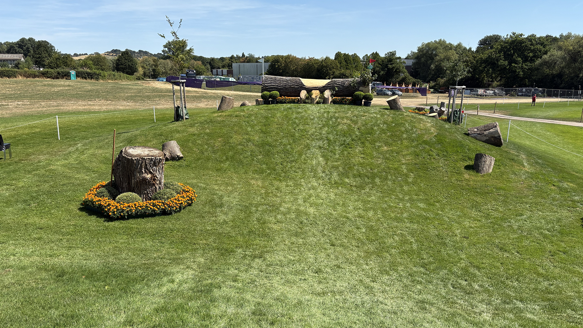Rolling terrain ahead of a fence on the eventing World Championships cross-country course
