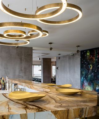 kitchen with statement circular lights and onyx kitchen counter