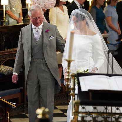 King Charles walked Meghan Markle down the aisle at her royal wedding to Prince Harry in 2018.