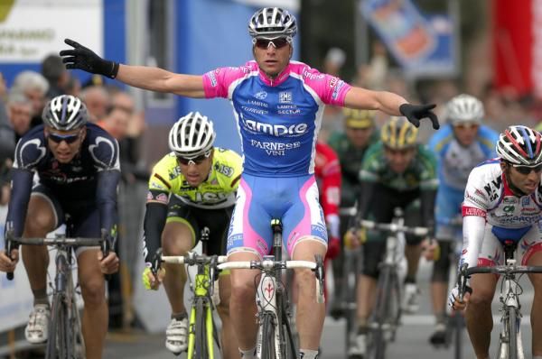 Petacchi spreads his wings as he crosses the line