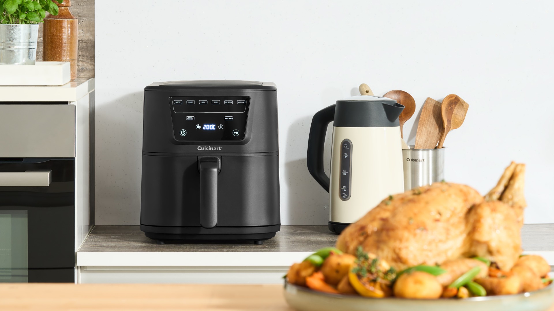 Cuisinart air fryer on countertop next to kettle