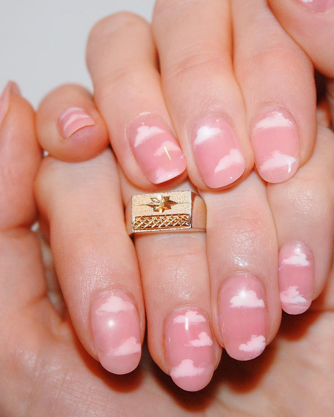 pink clouds nail design